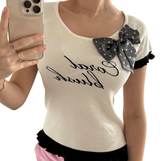 Japanese brand coquette white and black spell out tee with bow details S/M